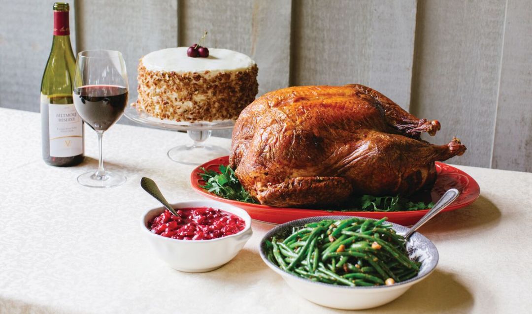 Roast turkey paired with glasses of Biltmore white wine