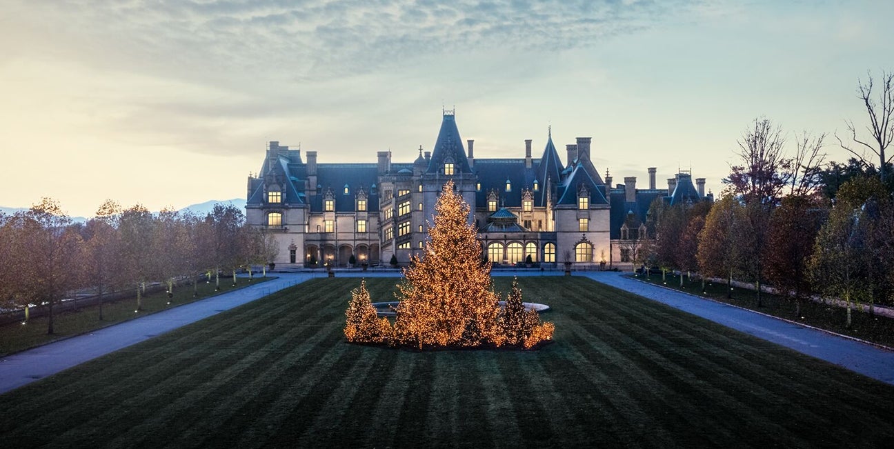 View of Biltmore House & lawn lit for Christmas