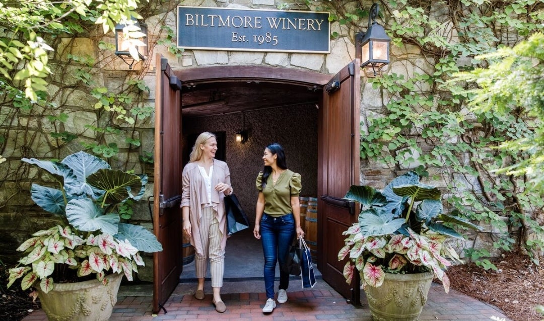 Two women walking out of Biltmore Winery