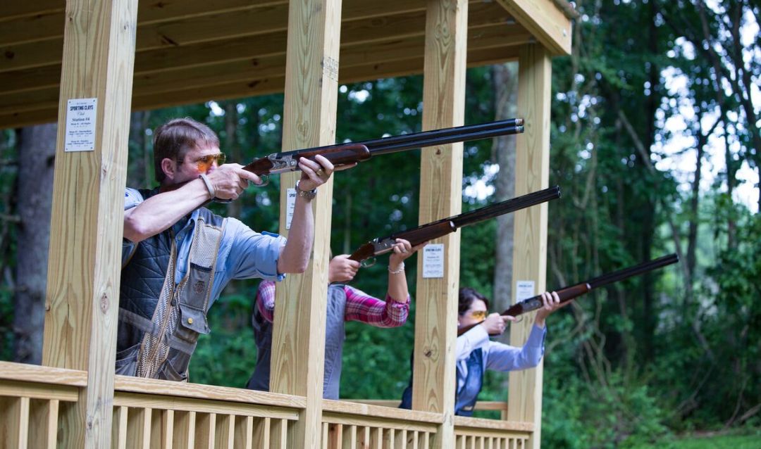 A group of people participating in Shooting Clay at Biltmore.