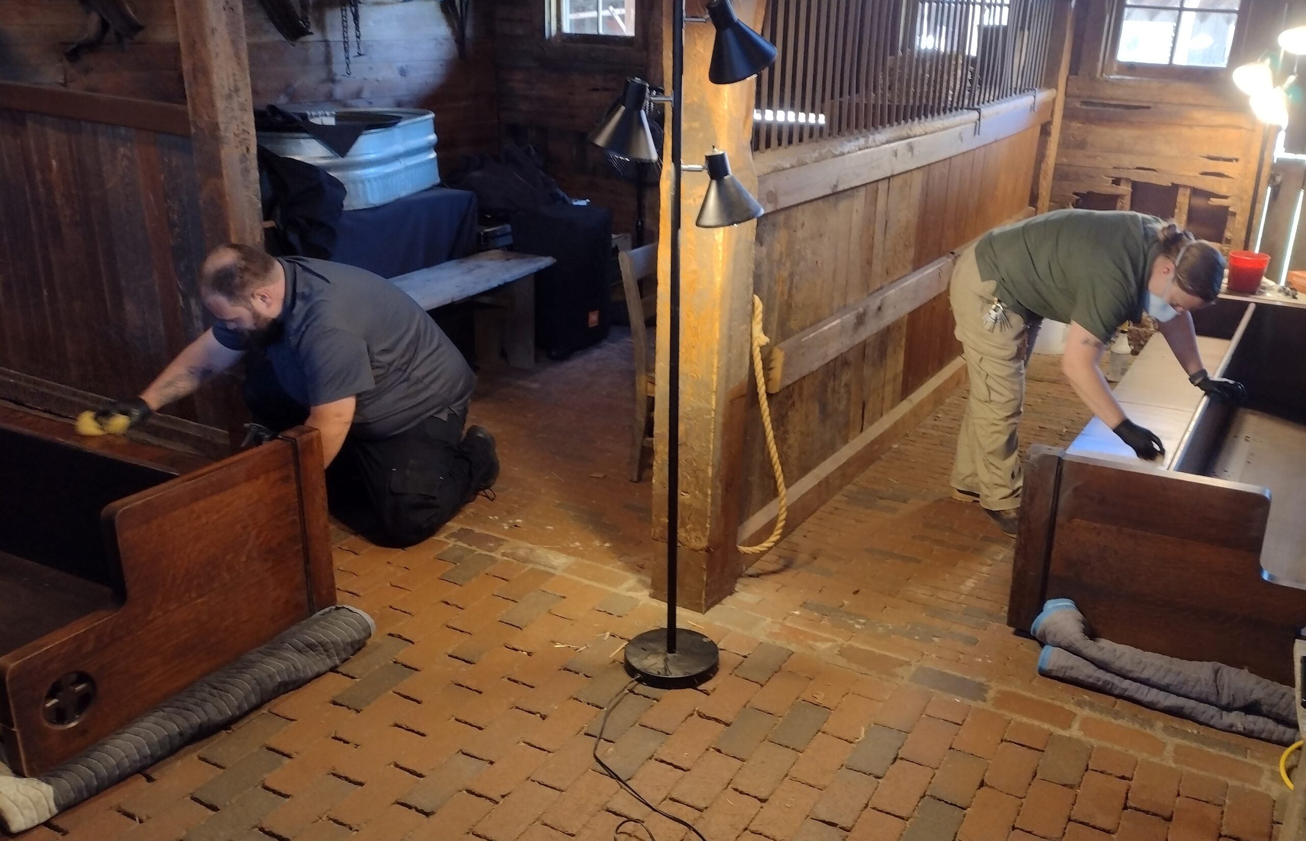 Pews from The Cathedral of All Souls were cleaned and stored at the estate as the community recovers from Helene.