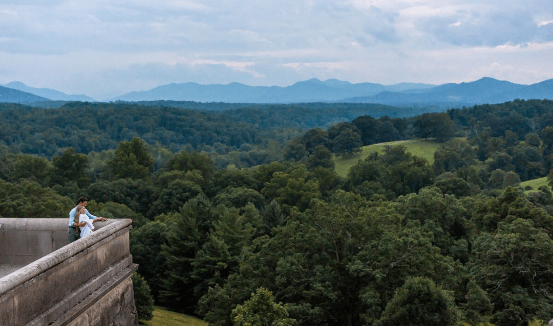 Annual Passholders admire the view from the South Terrace of Biltmore House.